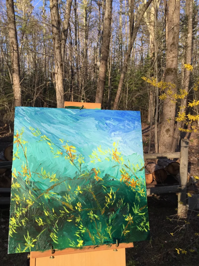 Painting the forsythia outdoors